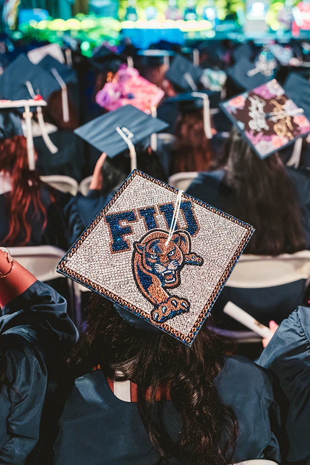 FIU panther decoration on Fall 2026 commencement grad cap